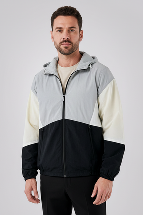 Jaqueta corta vento Habitat Masculino em poliéster com capuz, design color block em cinza, off-white e preto.